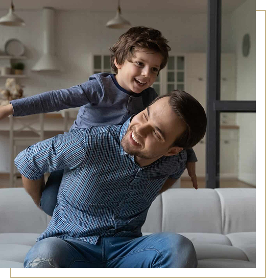 Father and son smiling